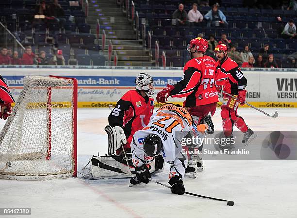 Sebastian Furchner of Wolfsburg scores his teams second goal during the DEL Play-Off game between Hannover Scorpions and Grizzly Adams Wolfsburg at...