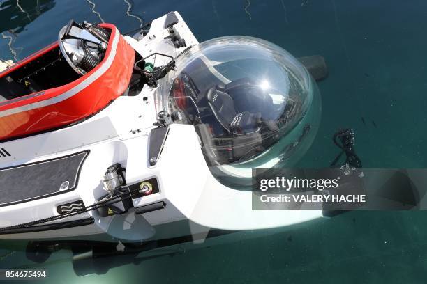 This photo taken on September 27, 2017 at the Hercules Port in Monaco shows a personal submarine during the 26th edition of the International Monaco...