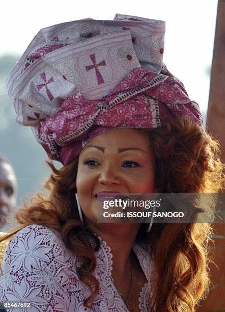 Cameroonian President's wife Chantal Biya welcomes Pope Benedict XVI during the welcoming ceremony at the airport in Yaounde on March 17, 2009. Pope...