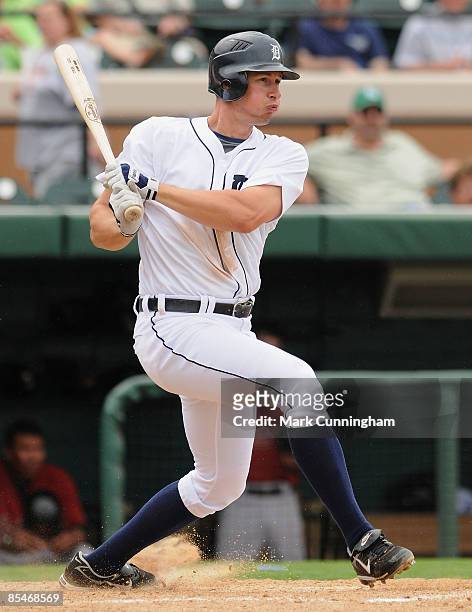 Don Kelly of the Detroit Tigers bats against the Houston Astros during the spring training game at Joker Marchant Stadium March 17, 2009 in Lakeland,...