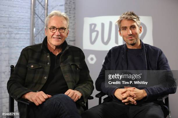 Larry Lamb and George Lamb pose for a photo after discussing their new television programme 'Britain by Bike with Larry and George Lamb' during a...