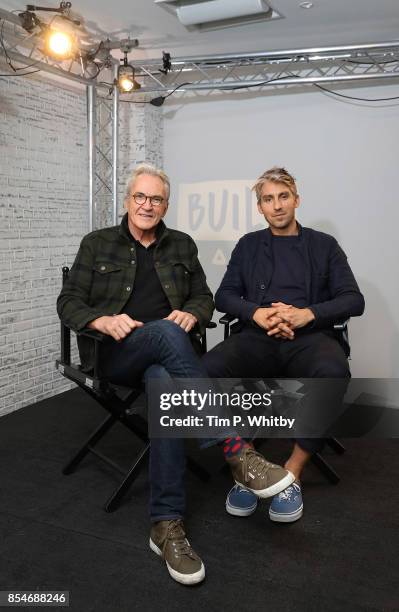 Larry Lamb and George Lamb pose for a photo after discussing their new television programme 'Britain by Bike with Larry and George Lamb' during a...