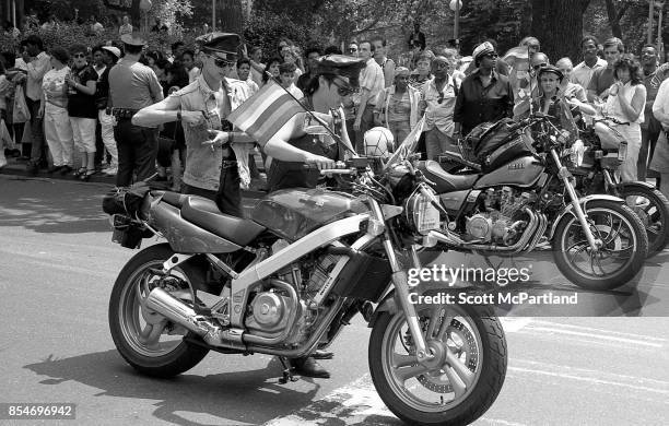 Activists from the LGBTQ community prepare to ride their motorcycles at the start of the Gay Pride Parade, commemorating the 20th anniversary of the...