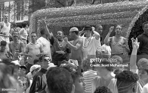 Gay rights activists smile and wave to the crowd from a parade float during the 1989 Gay Pride Parade in Greenwich Village, Manhattan commemorating...