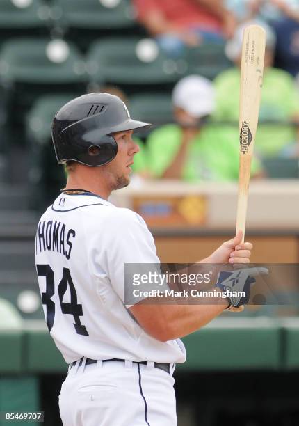 Clete Thomas of the Detroit Tigers bats against the Houston Astros during the spring training game at Joker Marchant Stadium on March 17, 2009 in...