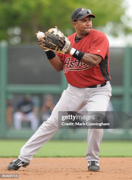 Miguel Tejada of the Houston Astros fields against the Detroit Tigers during the spring training game at Joker Marchant Stadium on March 17, 2009 in...