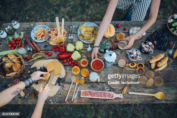 various food on the old wooden table - dip stock pictures, royalty-free photos & images