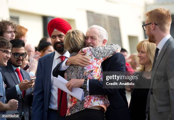 Leader of Labour Party Jeremy Corbyn is greeted by delegates as he arrives to deliver his keynote speech at the Labour Party on the annual conference...