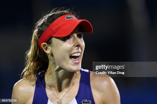 Alize Cornet of France reacts after losing a point during the third round Ladies Singles match against Varvara Lepchenko of the United States on Day...