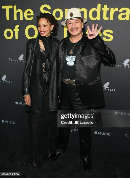 Cindy Blackman and Carlos Santana attend the premiere of Apple Music's "Clive Davis: The Soundtrack Of Our Lives" on September 26, 2017 in Los...