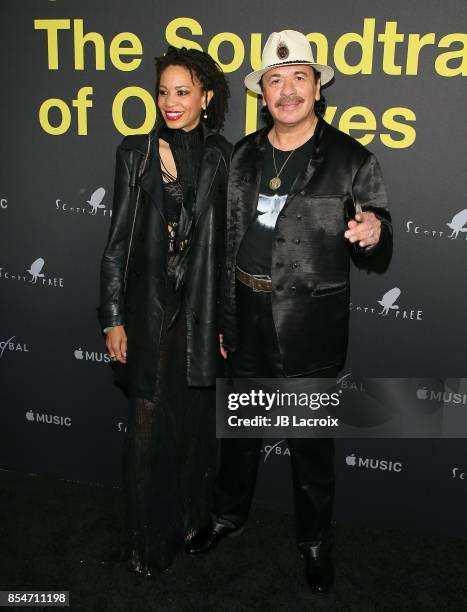 Cindy Blackman and Carlos Santana attend the premiere of Apple Music's "Clive Davis: The Soundtrack Of Our Lives" on September 26, 2017 in Los...