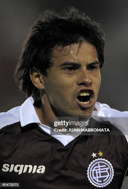 Argentina's Lanus forward Santiago Biglieri celebrates after scoring a goal against Chile's Everton during their Copa Libertadores 2009 Group 6...