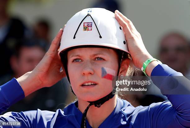 Woman firefighter competes during the 13th World Championship, among men and VI World Championship among women in fire and rescue sports, with the...