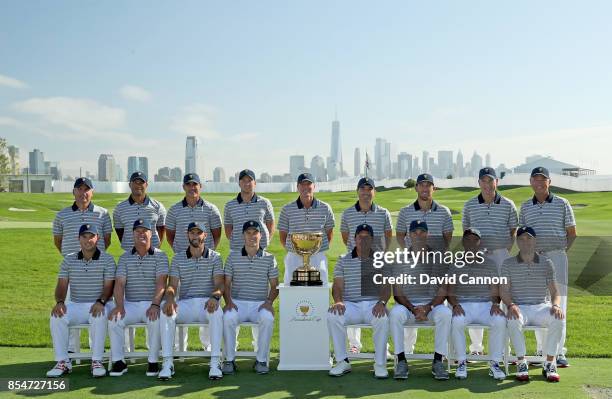 The United States Team pose for the official team photograph Fred Couples , Tiger Woods , Brooks Koepka, Daniel Berger, Steve Stricker , Kevin...