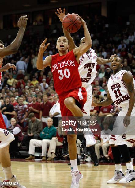 Stephen Curry of the Davidson Wildcats goes up for a layup against the South Carolina Gamecocks during the first round of the NIT at the Colonial...