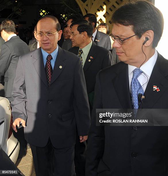 Myanmar's Prime Minister General Thein Sein leaving the Orchid garden after naming of an Orchid plant, Dendrobium Thien Sein in Singapore on March...