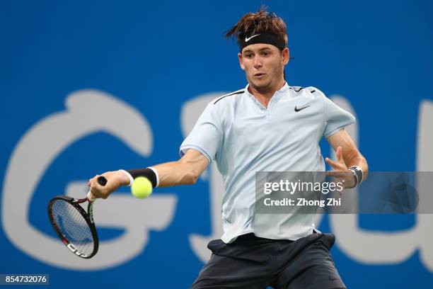 Jared Donaldson of the United States returns a shot during the match against Kyle Edmund of Great Britain during Day 3 of 2017 ATP Chengdu Open at...