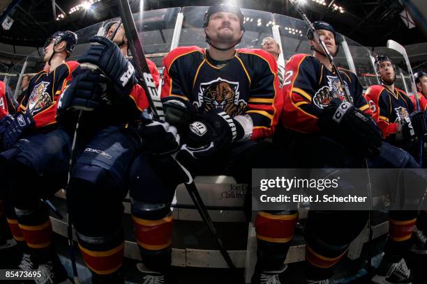 Nick Tarnasky of the Florida Panthers sits on the bench with Jassen Cullimore during the game against the Washington Capitals at the Bank Atlantic...