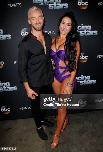 Artem Chigvintsev and Nikki Bella attend 'Dancing With The Stars' season 25 taping at CBS Televison City on September 26, 2017 in Los Angeles,...