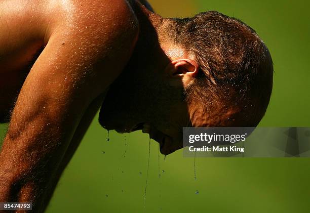 Jarrad McVeigh of the Swans recovers after winning a yo-yo test during a Sydney Swans AFL training session at Lakeside Oval on March 18, 2009 in...