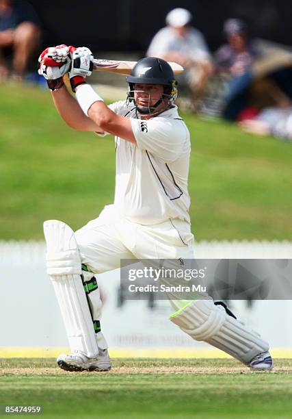 Jesse Ryder of New Zealand plays a shot onto the offside during day one of the First Test match between New Zealand and India at Seddon Park on March...