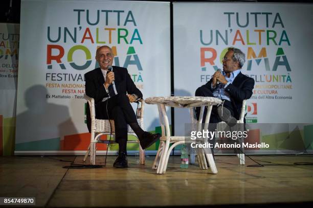 Italian Interior Minister Marco Minniti speaks with the journalist Mentana during the festival dell'Unità in Rome, Italy on September 27, 2017....