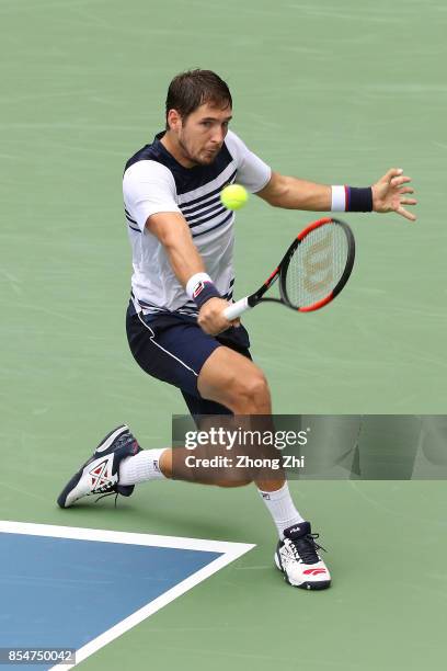 Dusan Lajovic of Serbia returns a shot during the match against Albert Ramos-Vinolas of Spain during Day 3 of 2017 ATP Chengdu Open at Sichuan...