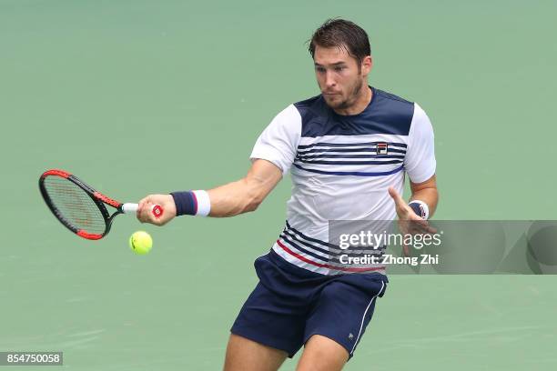 Dusan Lajovic of Serbia returns a shot during the match against Albert Ramos-Vinolas of Spain during Day 3 of 2017 ATP Chengdu Open at Sichuan...