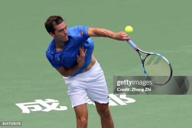 Albert Ramos-Vinolas of Spain serves during the match against Dusan Lajovic of Serbia during Day 3 of 2017 ATP Chengdu Open at Sichuan International...