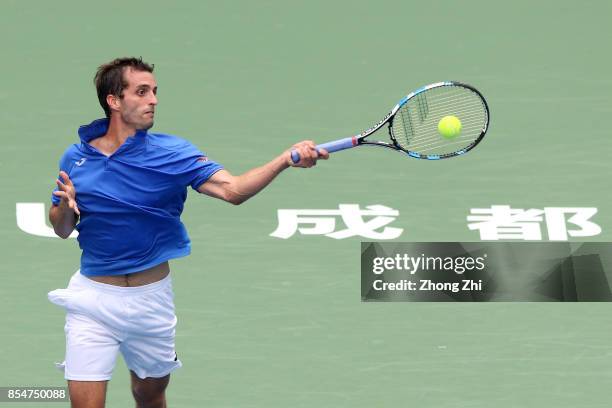 Albert Ramos-Vinolas of Spain returns a shot during the match against Dusan Lajovic of Serbia during Day 3 of 2017 ATP Chengdu Open at Sichuan...