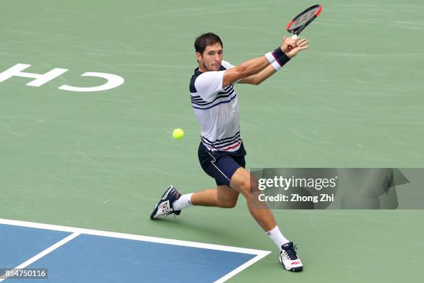 Dusan Lajovic of Serbia returns a shot during the match against Albert Ramos-Vinolas of Spain during Day 3 of 2017 ATP Chengdu Open at Sichuan...