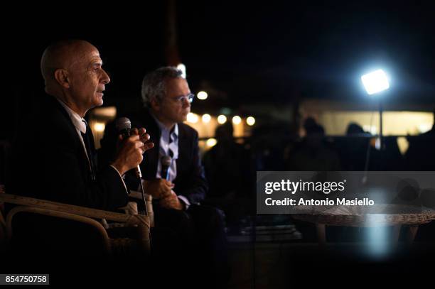 Italian Interior Minister Marco Minniti speaks with the journalist Mentana during the festival dell'Unità in Rome, Italy on September 27, 2017....