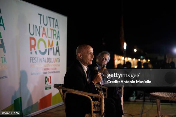 Italian Interior Minister Marco Minniti speaks with the journalist Mentana during the festival dell'Unità in Rome, Italy on September 27, 2017....