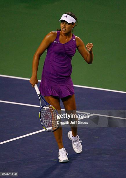 Ana Ivanovic of Serbia pumps her fist after winning a point against Flavia Pennetta during the BNP Paribas Open at the Indian Wells Tennis Garden on...