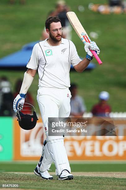 Daniel Vettori of New Zealand celebrates his century during day one of the First Test match between New Zealand and India at Seddon Park on March 18,...