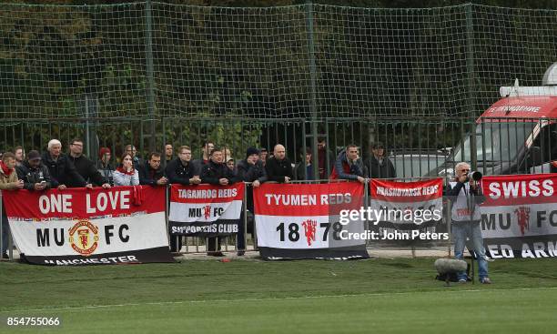 Fans watch from the stands during the UEFA Youth League match between CSKA Moskva U19s and Manchester United U19s at Oktyabr Stadium on September 27,...