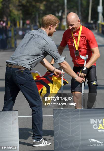 Prince Harry presents medals during the Cycling on day 5 of the Invictus Games Toronto 2017 in High Park on September 27, 2017 in Toronto, Canada....