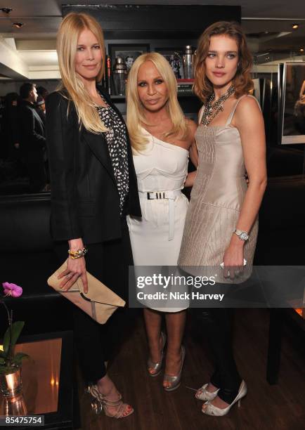 Model Claudia Schiffer, fashion designer Donatella Versace and model Natalia Vodianova attend the Fashion Fringe 2009 at Covent Garden Launch Party...