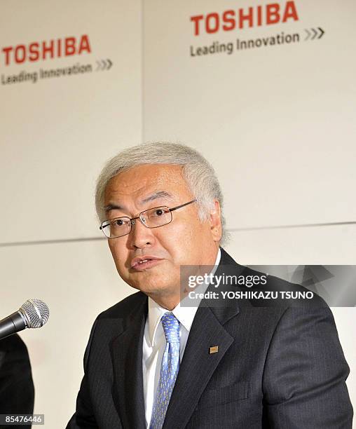 Japan's electronics giant Toshiba executive vice president Norio Sasaki speaks during a press conference at the company headquarters in Tokyo on...