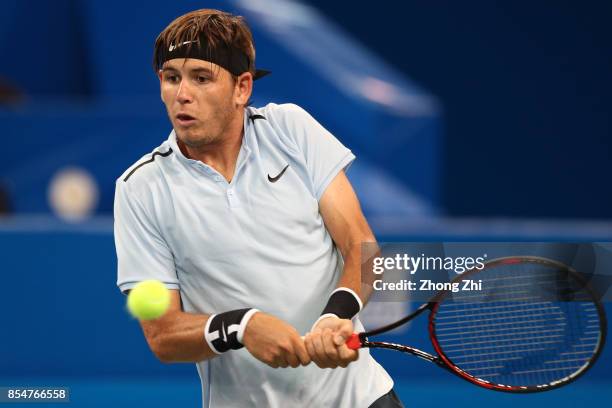 Jared Donaldson of the United States returns a shot during the match against Kyle Edmund of Great Britain during Day 3 of 2017 ATP Chengdu Open at...