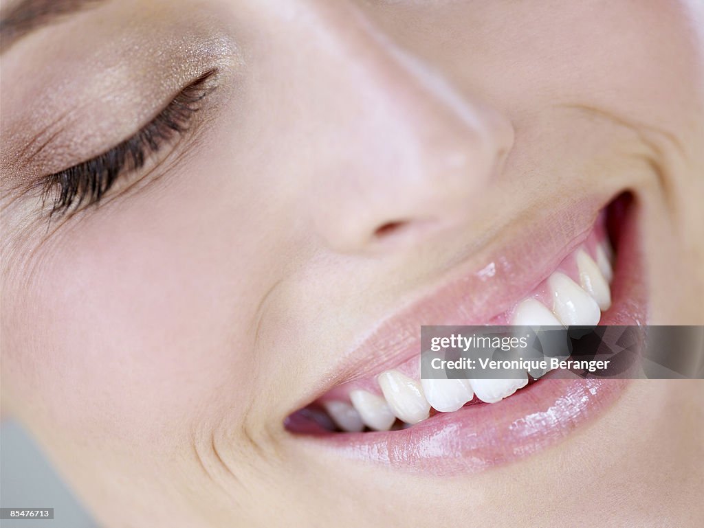 Woman laughing, close-up