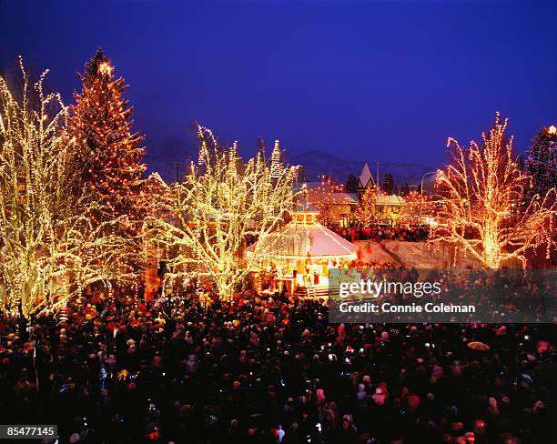 a town's tree lighting festival at christmas. - leavenworth washington bildbanksfoton och bilder