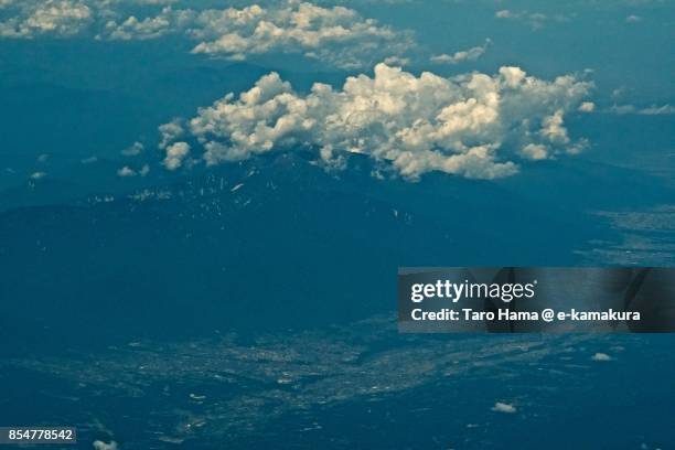 kiso mountains and iida city in nagano prefecture daytime aerial view from airplane - 木曽山脈 ストックフォトと画像
