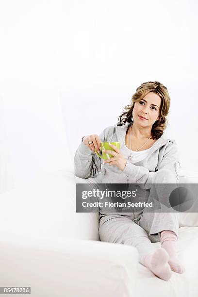 Bettina Cramer holds a cup while posing pregnant of seven months on January 15, 2009 in Berlin, Germany. The TV presenter gave birth to her twins...