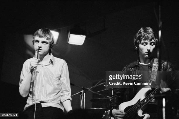 Singer and lyricist Mark E. Smith and bassist Tony Friel, of English rock group The Fall, performing at the Electric Circus, Manchester, 2nd October...