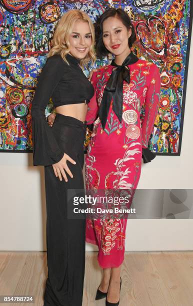 Tallia Storm and Betty Bachz attend the private view and launch of Sacha Jafri's 18 year retrospective global tour "Universal Consciousnes" at The...