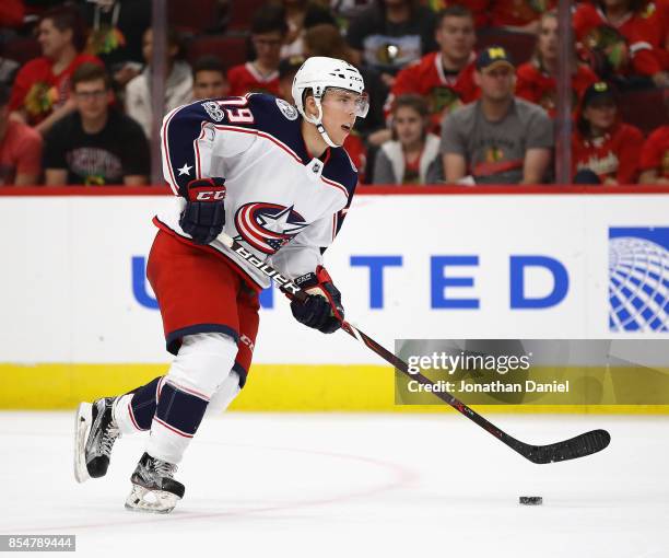 Vitaly Abramov of the Columbus Blue Jackets advances the puck against the Chicago Blackhawks during a preseason game at the United Center on...