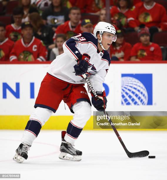 Vitaly Abramov of the Columbus Blue Jackets advances the puck against the Chicago Blackhawks during a preseason game at the United Center on...