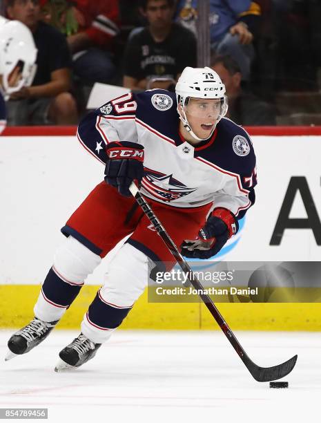 Vitaly Abramov of the Columbus Blue Jackets advances the puck against the Chicago Blackhawks during a preseason game at the United Center on...