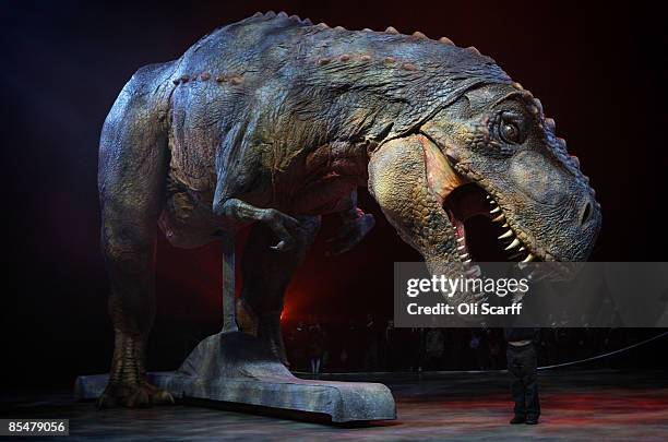 Jack Osbourne reacts to an adult Tyrannosaurs Rex robotic dinosaur as he performs in the O2 arena ahead of the forthcoming European leg of the live...
